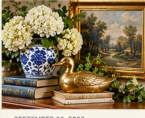 Collected home vignette with vintage art pottery brass and books