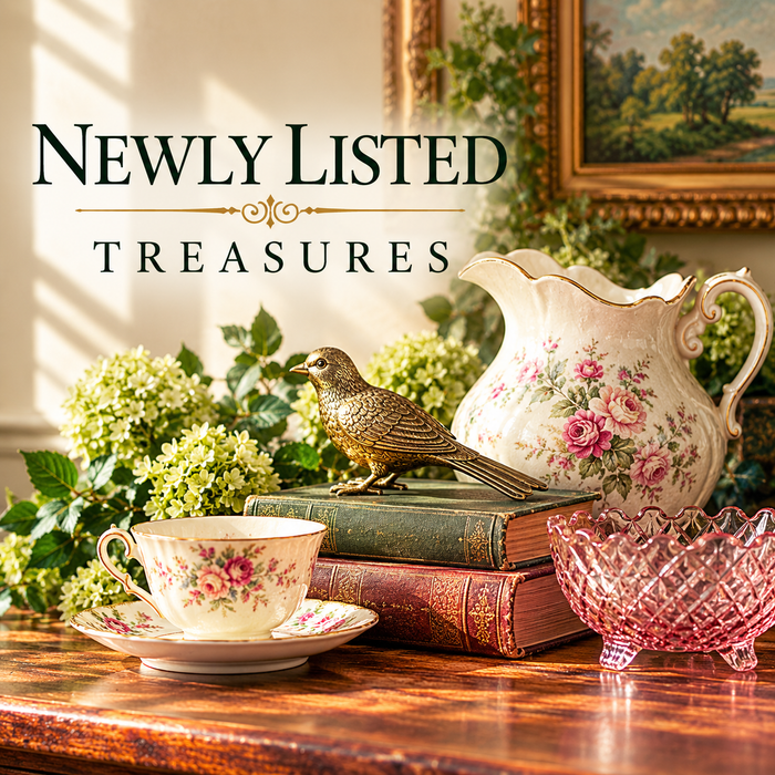 Newly listed vintage glassware, porcelain, brass, embroidered linens, needlework and jewelry arranged in a warm farmhouse interior