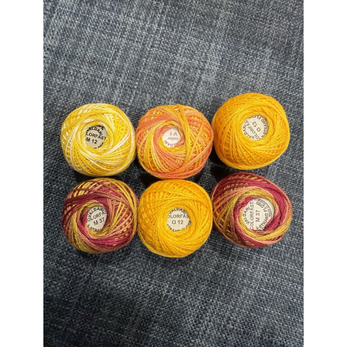 Valdani Perle Cotton Thread Lot 6 Sunflower Yellow Gold Variegated Colorfast – main view