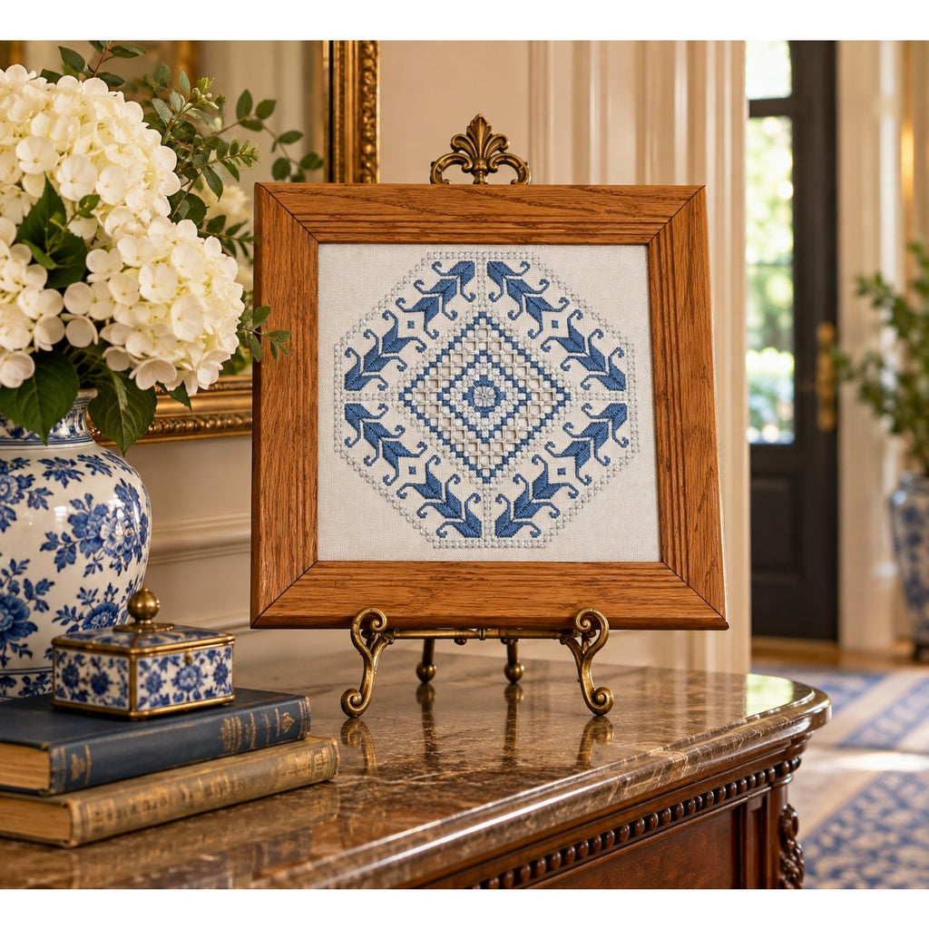 Vintage blue and white Hardanger embroidery needlework in oak frame