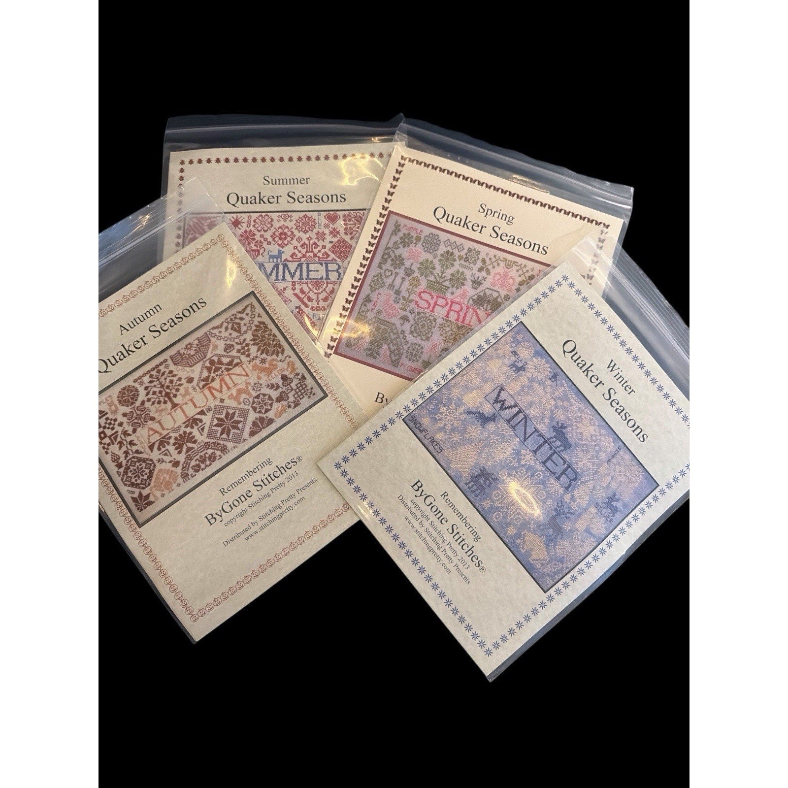 ByGone Stitches Quaker Seasons Set of 4 NOS Cross Stitch Patterns