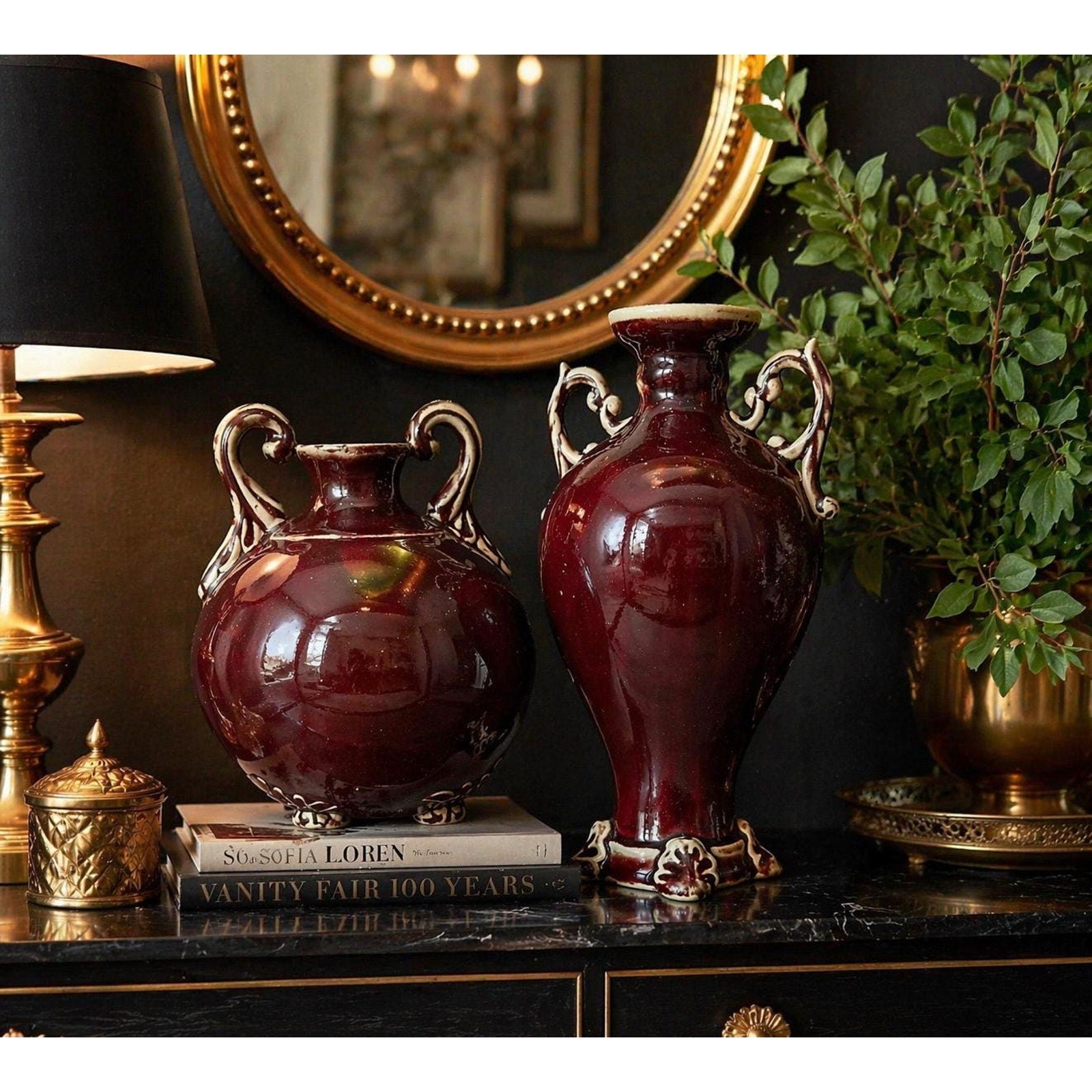 Oxblood Flambé Urn Pair: Hollywood Regency Red Ceramic Vases, Rococo Handles